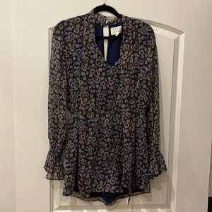 Purple floral romper.